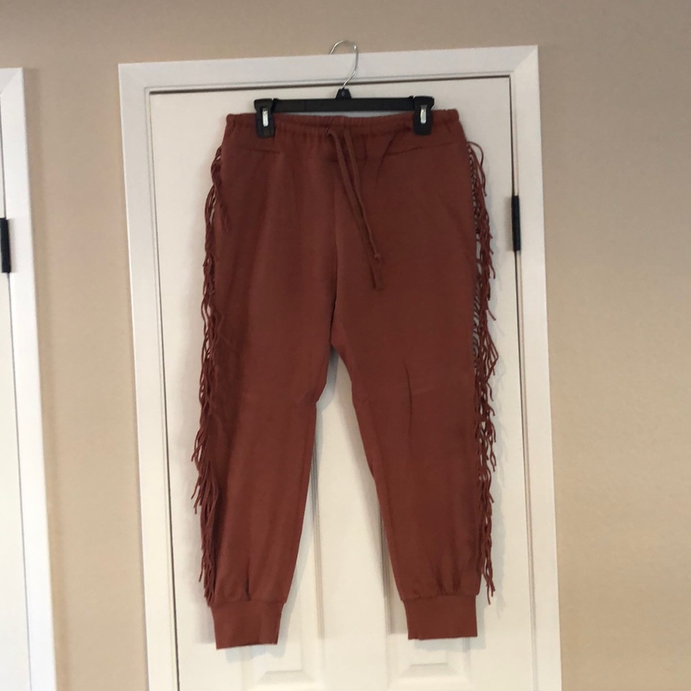 Kittenish fringe joggers